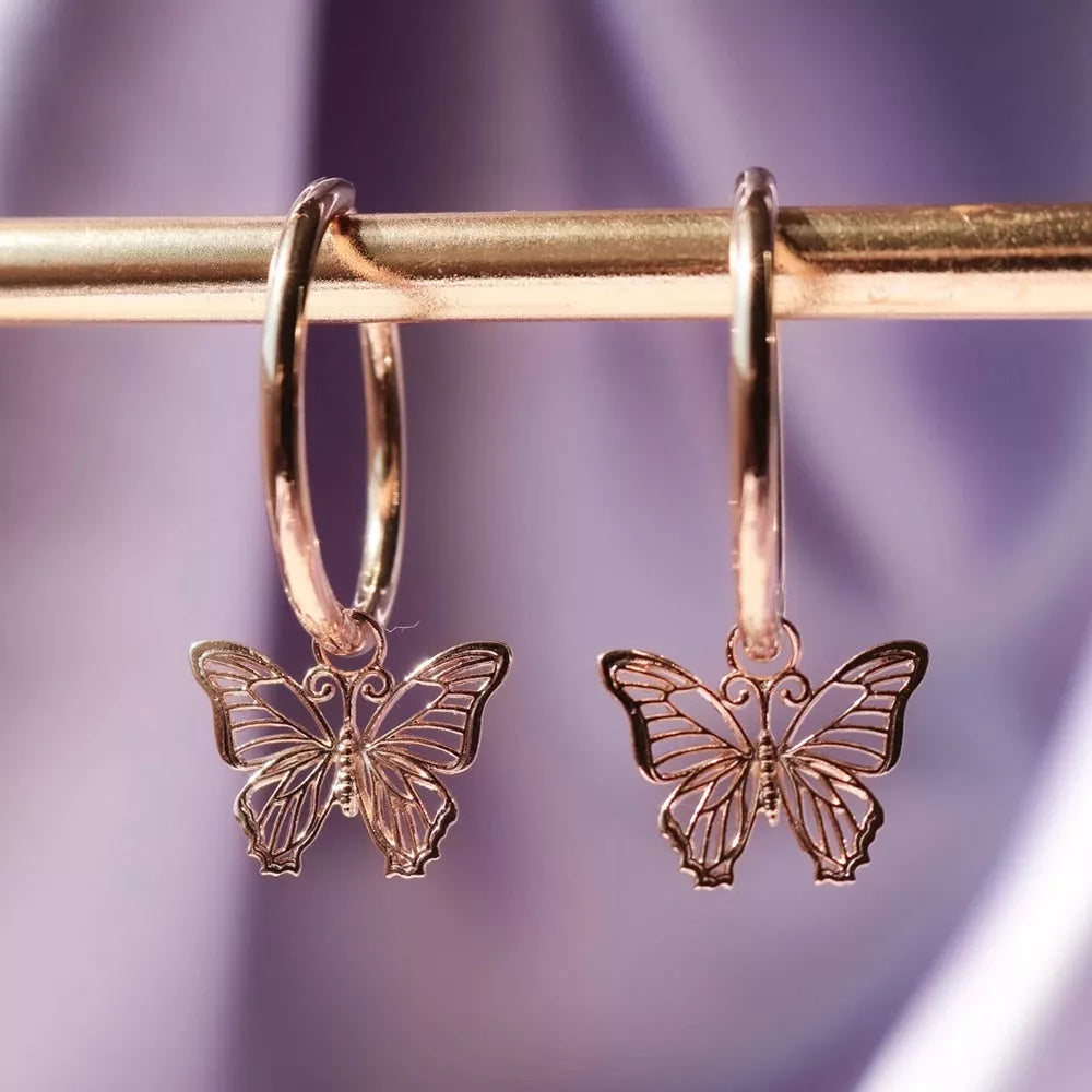 Butterfly earrings with elegant bow styling in rose gold and gold finishes