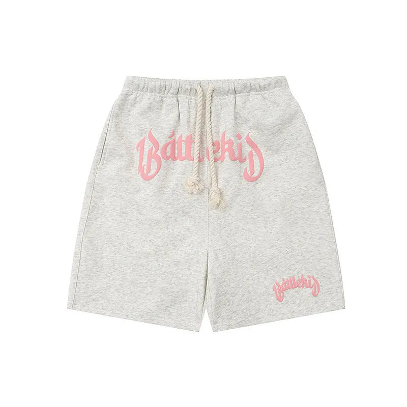 Cotton-blended cropped sweatpants in a loose street style fit, shown in available colours.