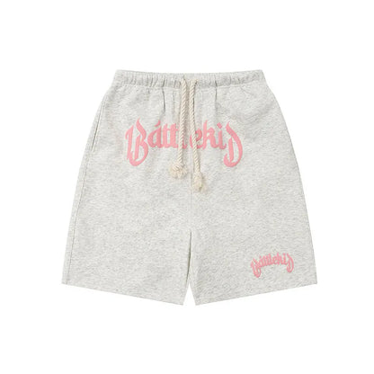Cotton-blended cropped sweatpants in a loose street style fit, shown in available colours.