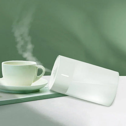 Columnar ultrasonic humidifier in pearl white measuring 140mm × 70mm with USB cable