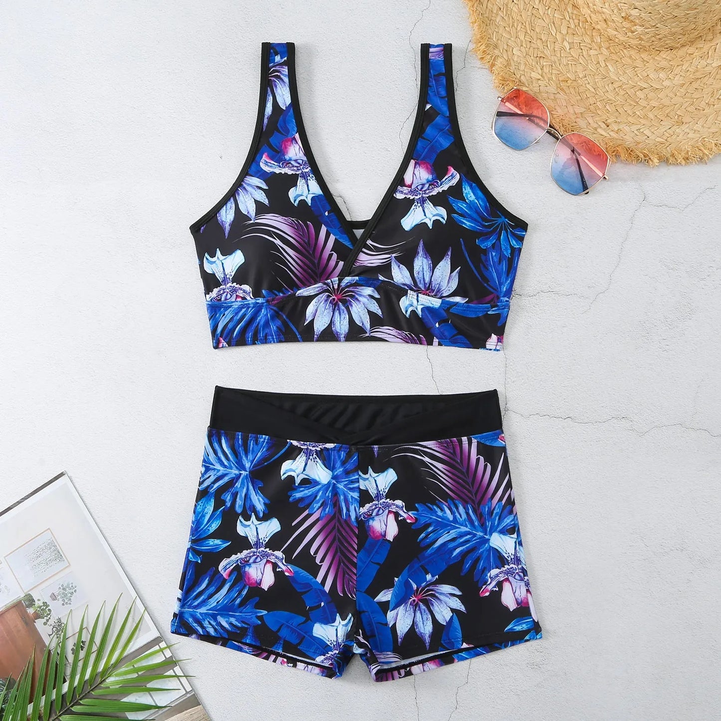 Women's two-piece printed swimsuit set with boxer-style briefs and sleeveless top in multi-colour pattern