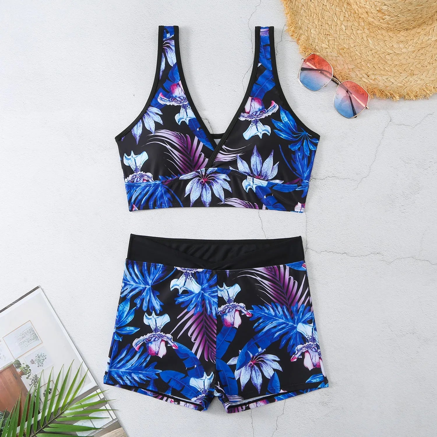Women's two-piece printed swimsuit set with boxer-style briefs and sleeveless top in multi-colour pattern