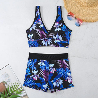 Women's two-piece printed swimsuit set with boxer-style briefs and sleeveless top in multi-colour pattern