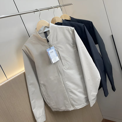 Men's stand collar casual jacket in polyester, shown in a neutral colour with straight hem and long sleeves.