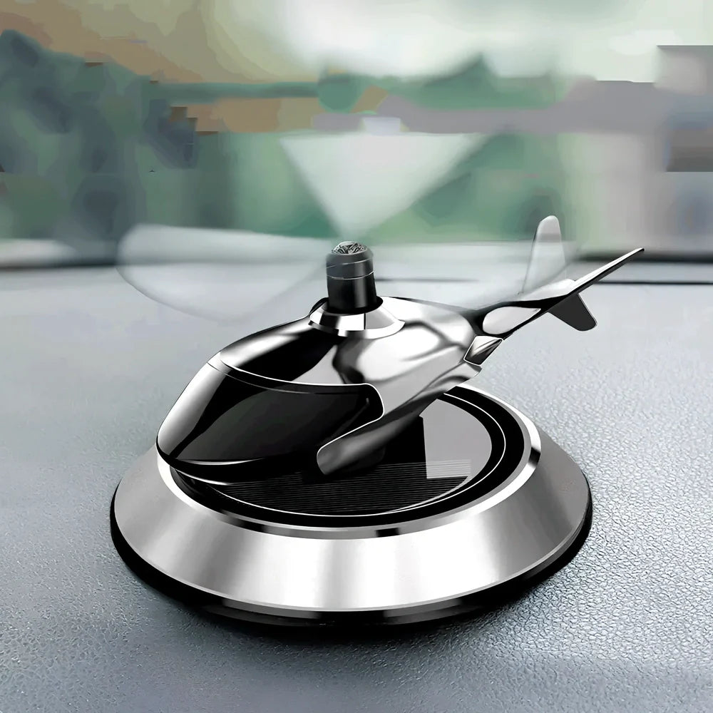 Solar helicopter car air freshener with rotating propeller on metal base, 180g weight
