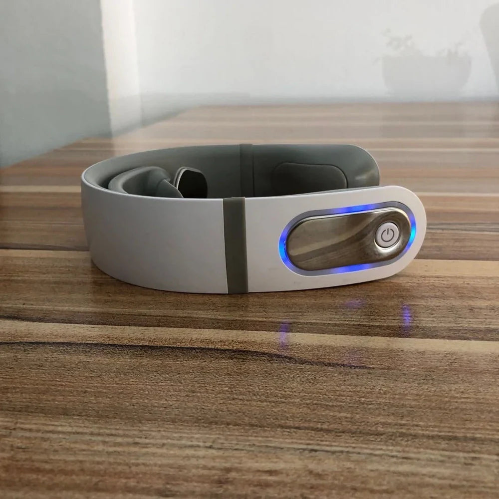 White shoulder neck massager with four rotating heads for mechanical kneading action