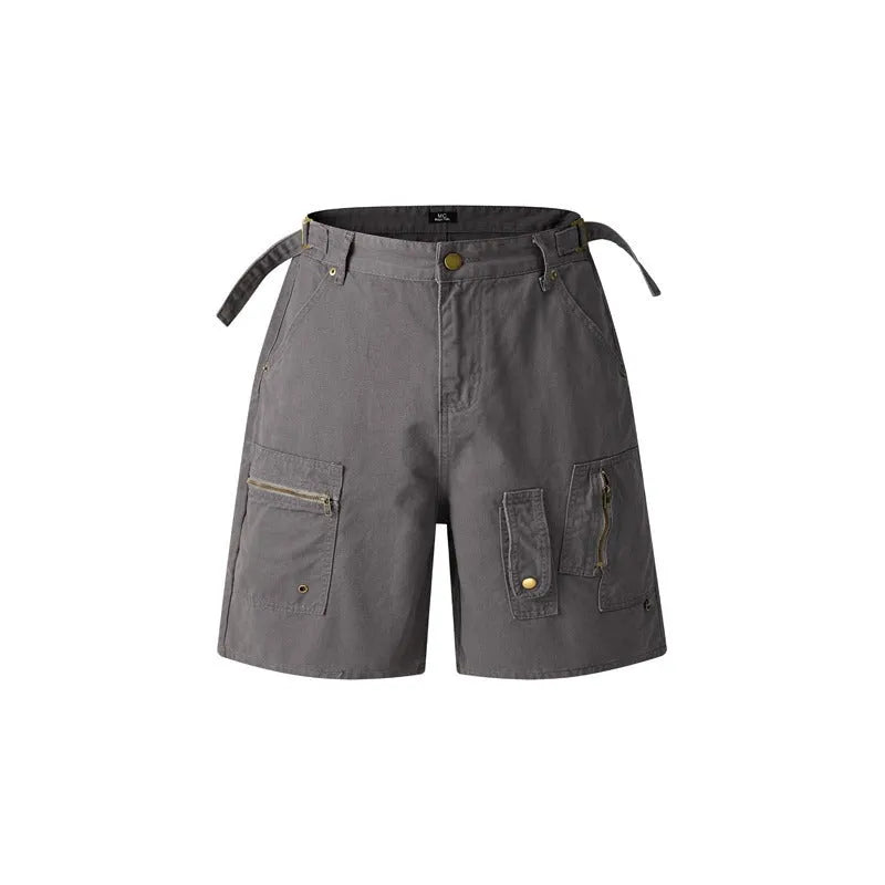 Retro loose-fit washed cotton workwear shorts in camouflage green colour with zip fly.