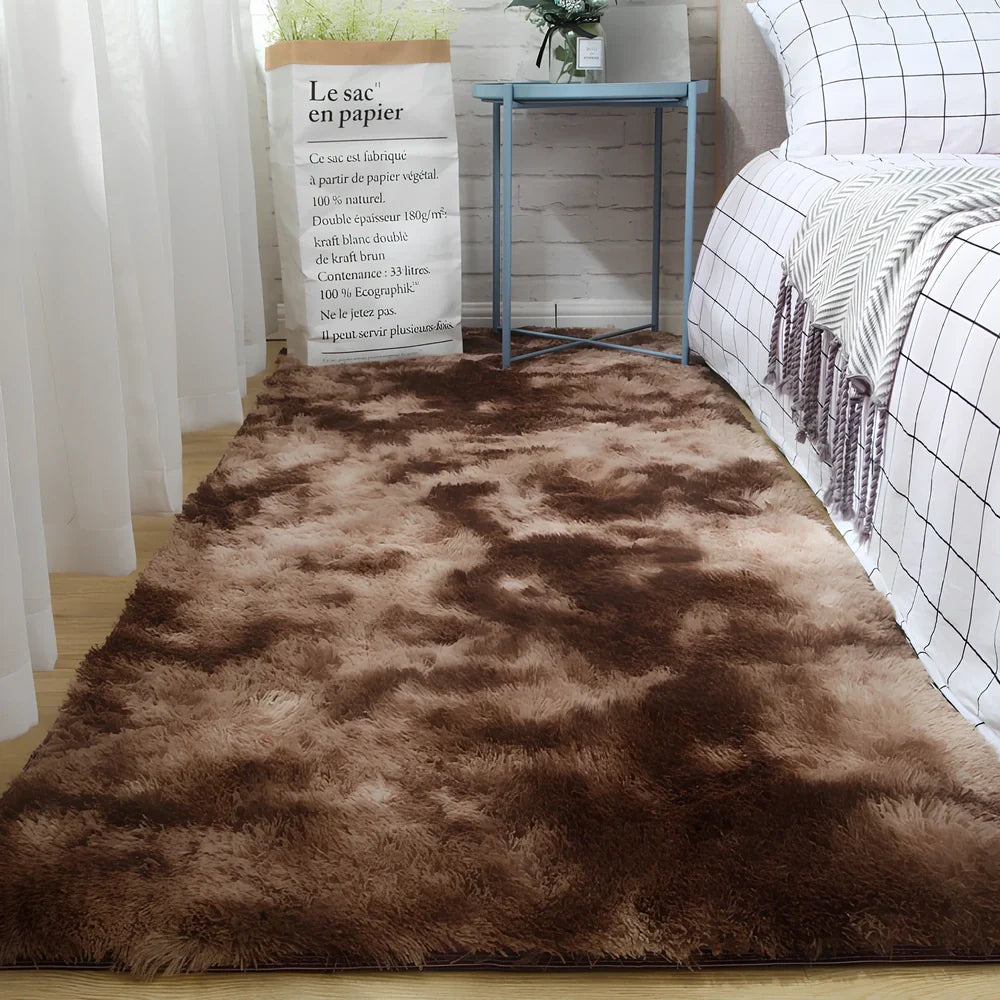 Tie-dyed variegated silk wool carpet floor mat showing organic colour patterns with polyester fibre suede backing