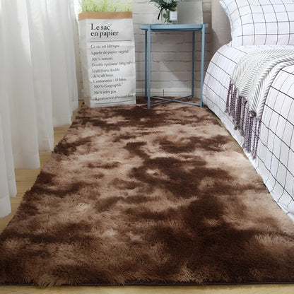 Tie-dyed variegated silk wool carpet floor mat showing organic colour patterns with polyester fibre suede backing