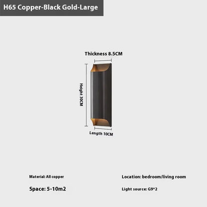 Minimalist copper wall lamp in black gold finish mounted beside bed