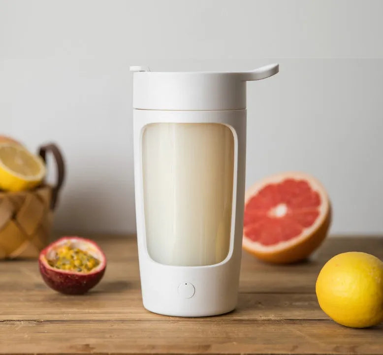Portable juice blender automatic mixing cup with 650ml capacity, 7.4W motor power, compact 121 x 90 x 196mm dimensions for smoothies and drinks on the go, available in black, blue, pink, and white colour options