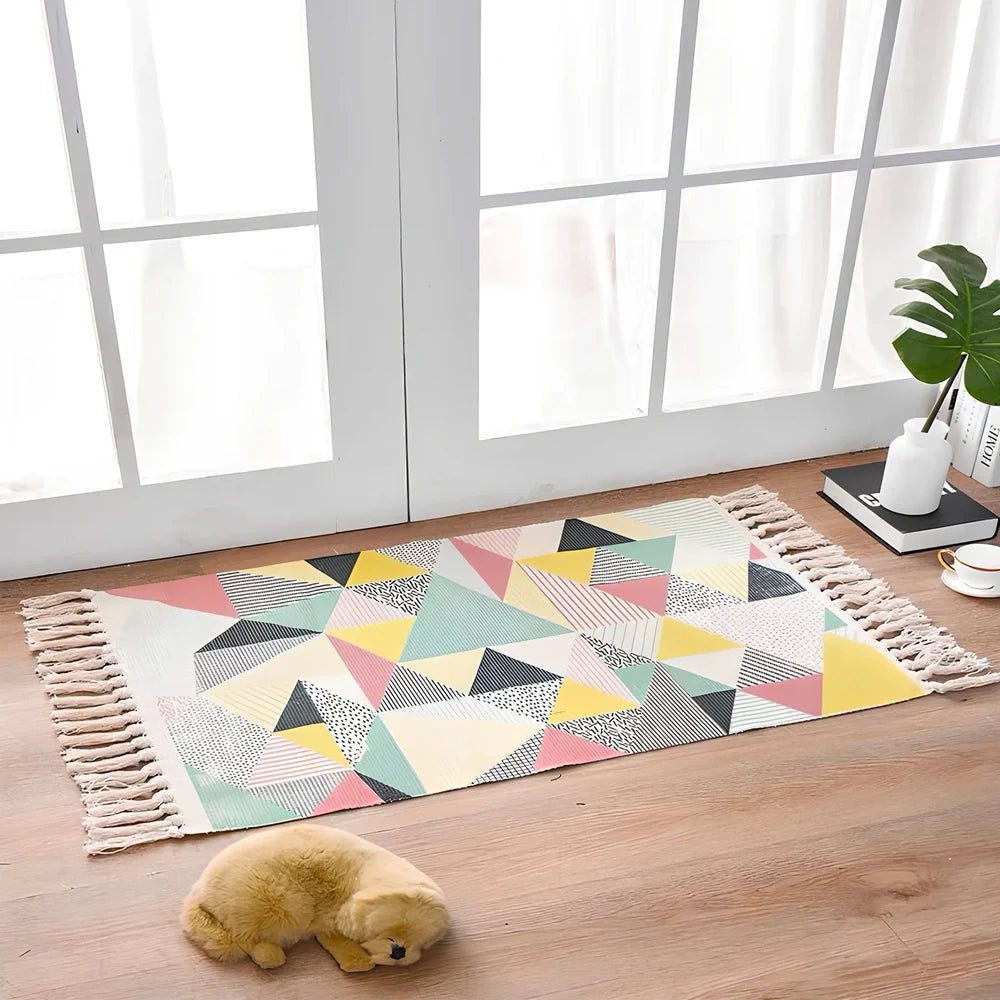 Hand-woven Scandinavian style linen cotton rug with woven tassels in plant-dyed colours measuring 60x90cm
