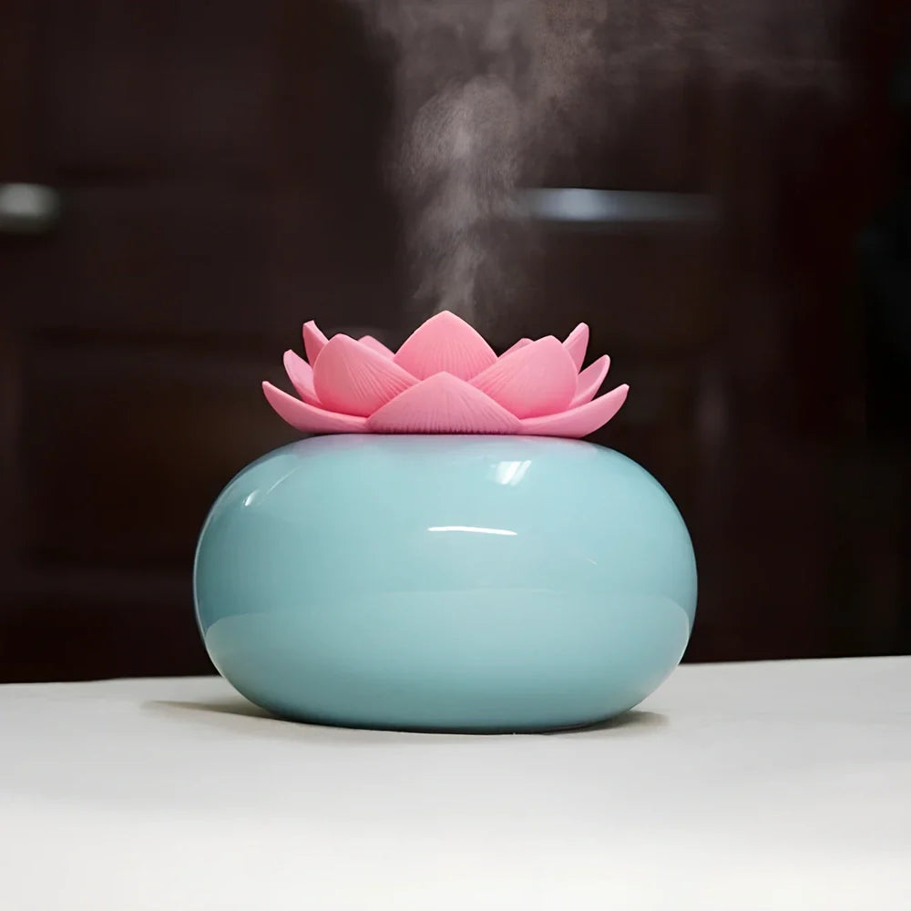 Lotus-shaped aromatherapy humidifier with ceramic base showing green and white colour option
