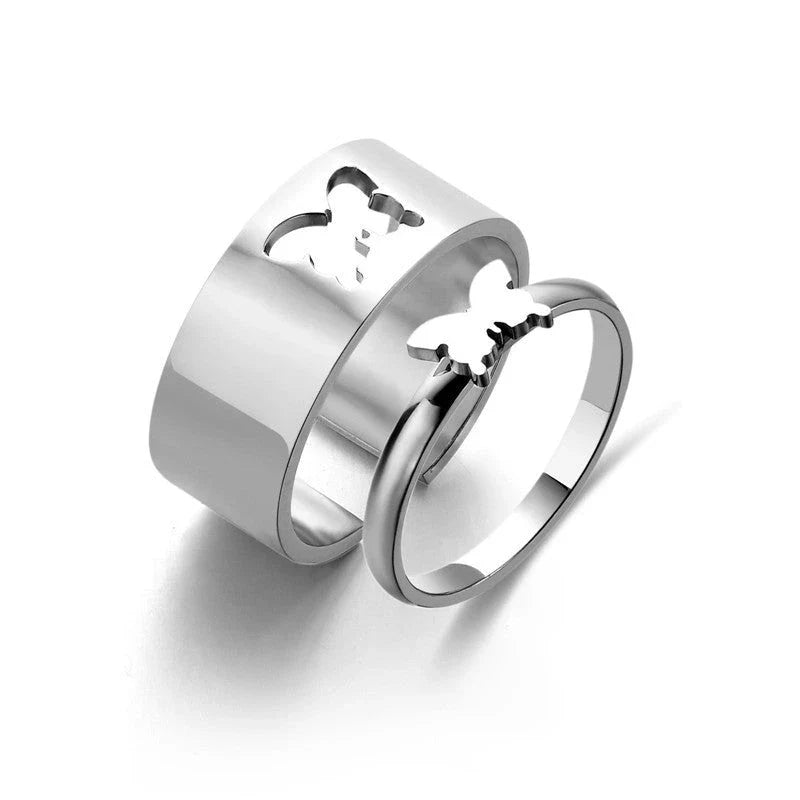 Elegant titanium steel ring with customizable peach, butterfly, and cross designs, perfect for special occasions and gift-giving