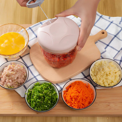 Manual garlic masher in blue, green, and pink colours showing small and large size options