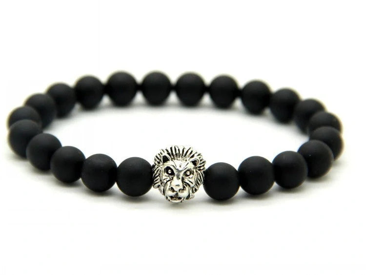 Carved stone bracelet featuring a powerful lion design, meant to enhance confidence and style.