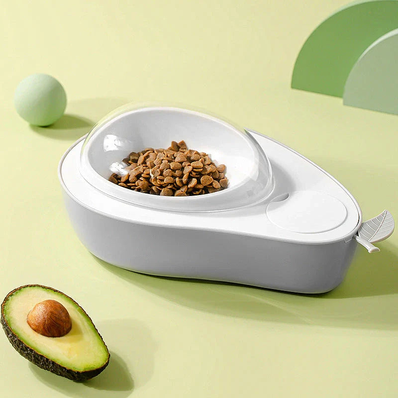 Avocado-shaped automatic pet feeder and water dispenser for dogs and cats, featuring slow-feed bowl, adjustable water flow, and durable construction