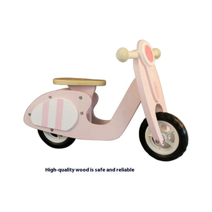 Pink wooden balance scooter for toddlers measuring 10 inches, designed for children aged 1-6 years