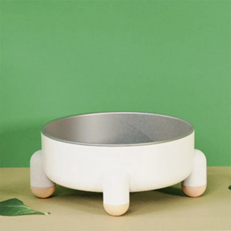 Green stainless steel pet bowl with anti-overturn base and high foot for dogs and cats.