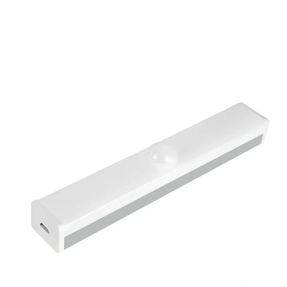 LED strip light with motion sensor in black finish, 30cm length with warm white illumination