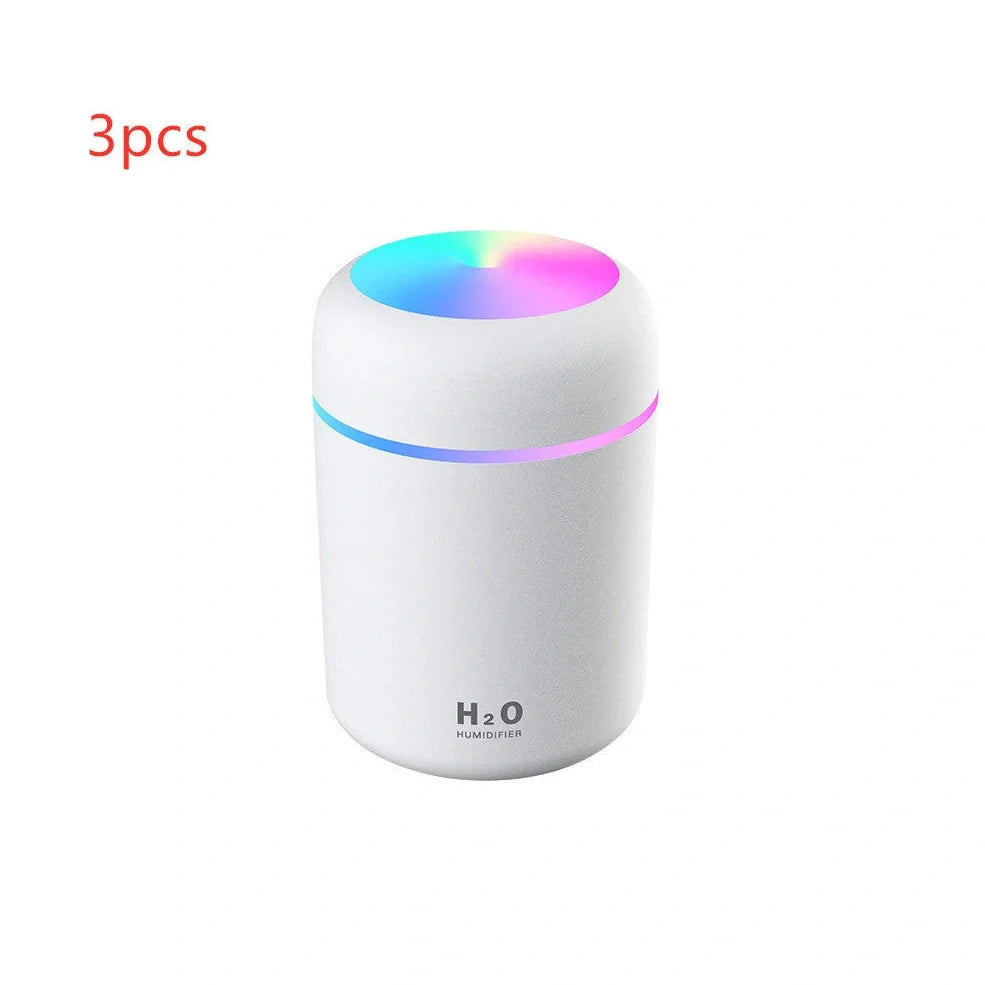 Compact USB car humidifier with colourful LED light and 300ml water tank for vehicle use