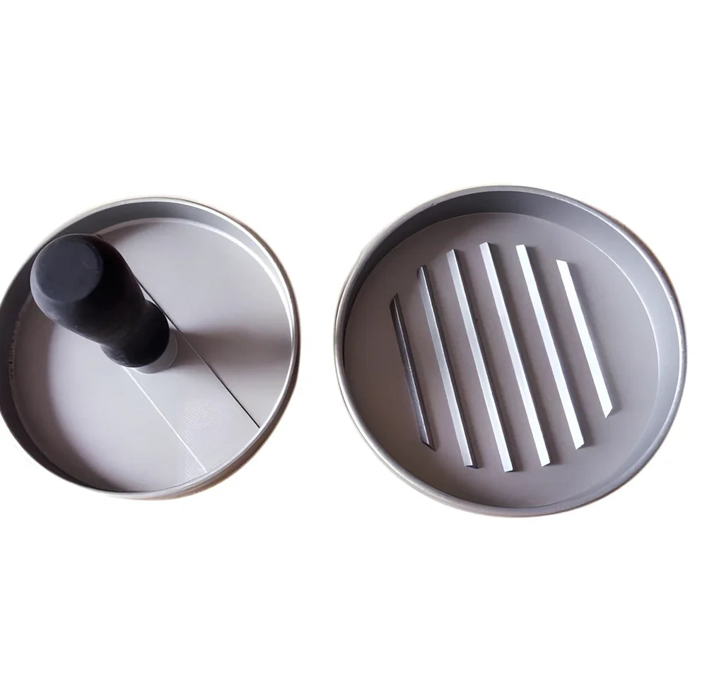 Aluminium burger press with handled plate creating 1cm thick patties on stable base