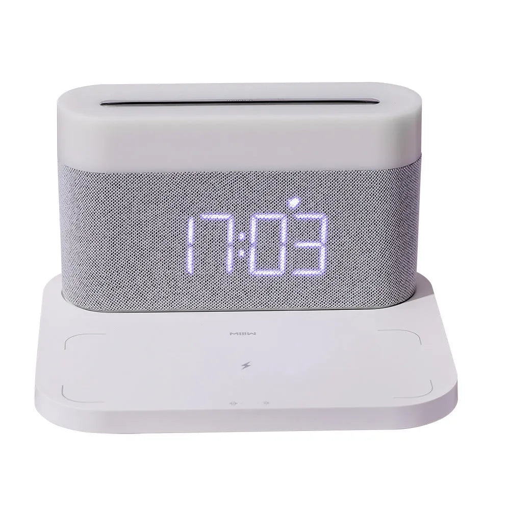 Four-in-one table lamp with clock and wireless phone charger, 12V Micro USB, White or Black