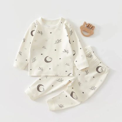 Baby wearing long-sleeved cotton pajamas with cartoon pattern, available in heights 66-120cm