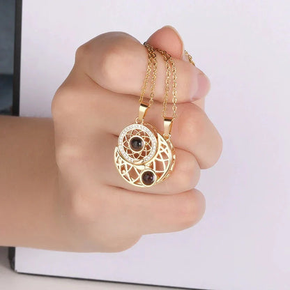 Personalized Sun and Moon Projection Necklace showcasing 100 languages I love you engraving