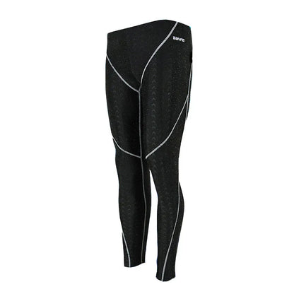 Men's black and grey cropped nylon swimming trunks with mesh lining, laid flat.
