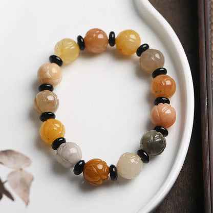 Hetian jinsi jade bracelet with geometric pumpkin beads and lotus bead decoration