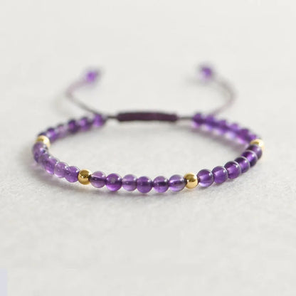 Women's freshwater pearl bracelet with stainless steel magnetic clasp on clear elastic cord