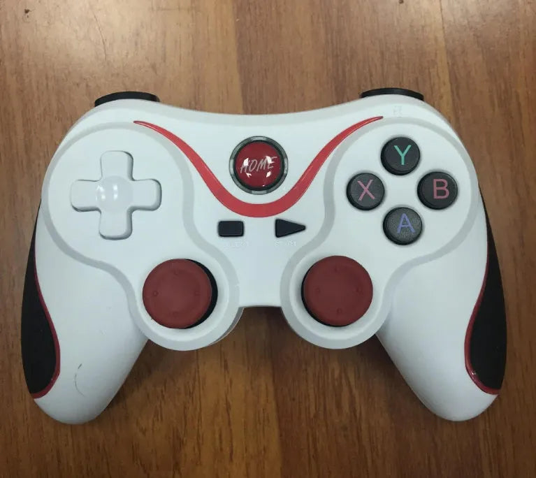 Upgraded X3 Bluetooth wireless game controller with mobile phone clip attached, showing textured grips and button layout