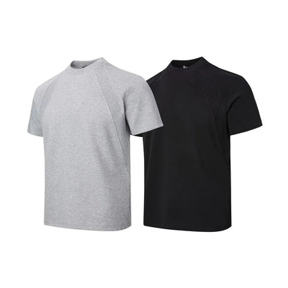 Man's loose fit black short sleeve top with textured air layer stitching detail.