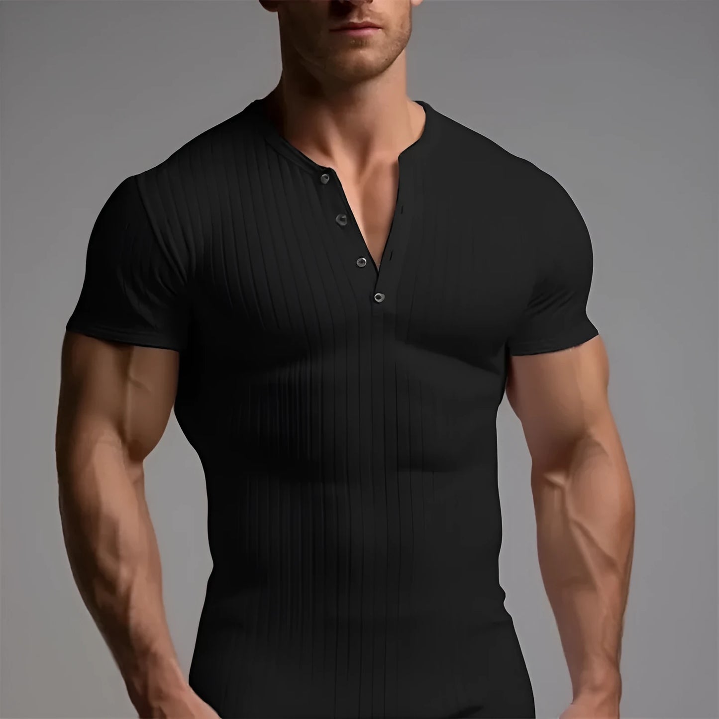 Slim-fitting solid colour sports T-shirt for men on a grey background.