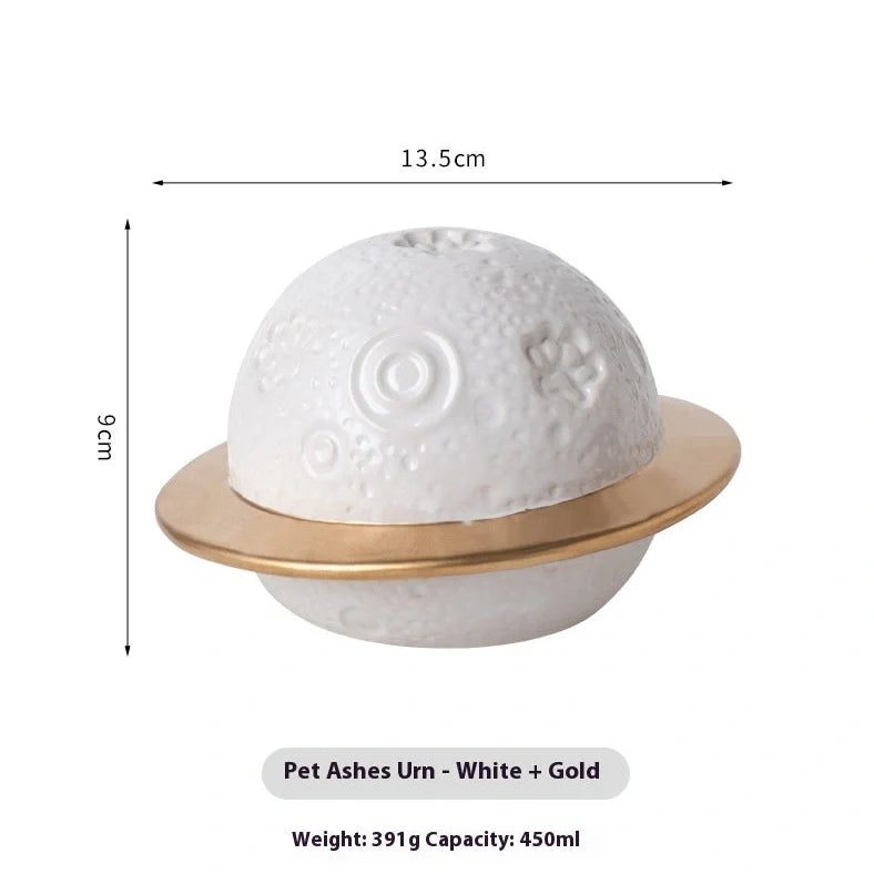 Handmade ceramic cinerary casket with cosmic starry sky design and cat-dog motifs in multiple colours