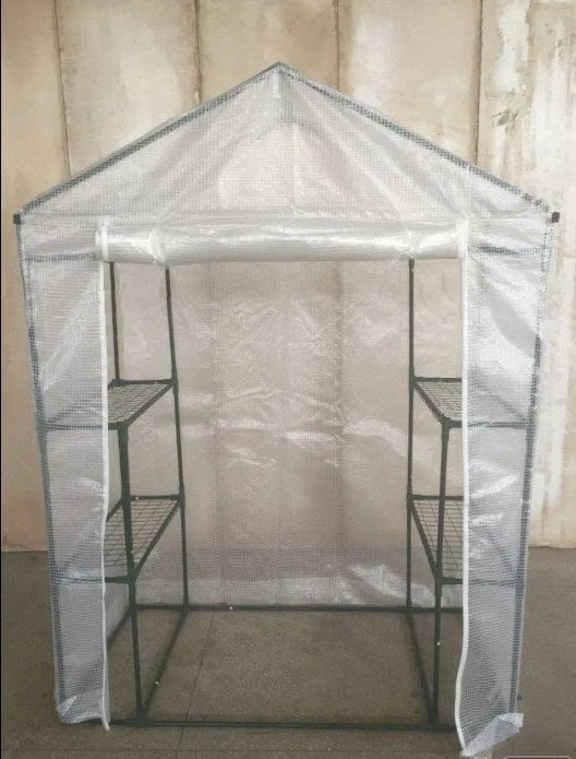 Green PE mesh greenhouse stand with steel frame measuring 143cm long by 73cm wide by 195cm tall