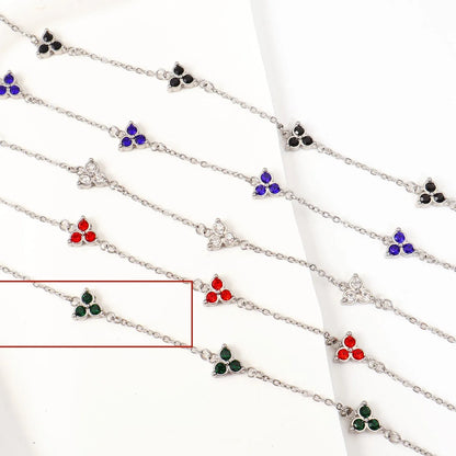 Women's stainless steel bracelet with three triangle-shaped charms in different coloured stone settings