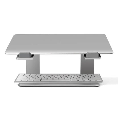 Black aluminium alloy laptop stand raising a laptop for ergonomic desktop use
