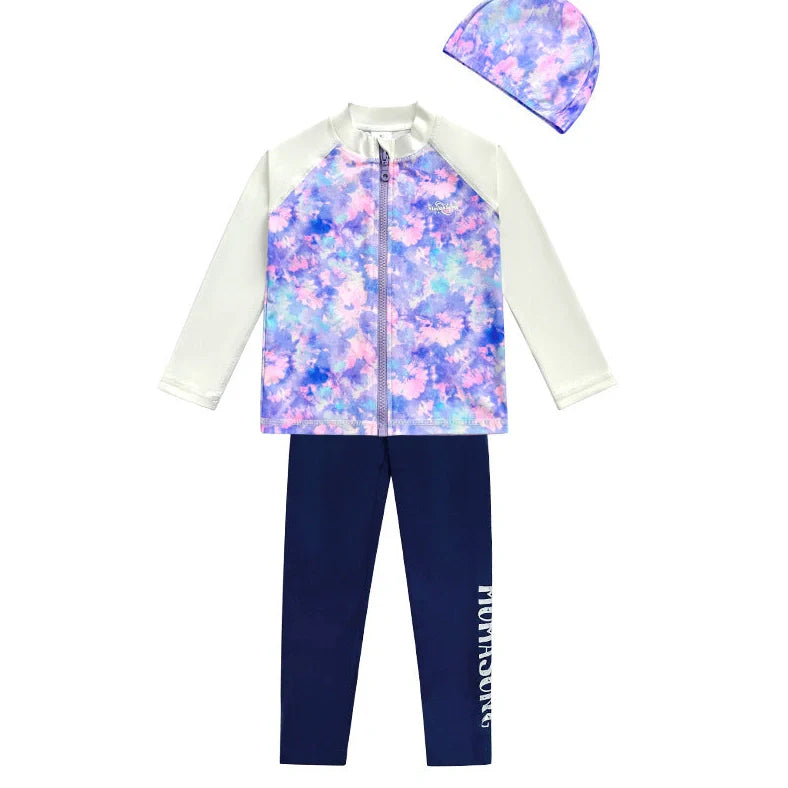 Girls' long sleeve swimsuit with split skirt in gradually varied pink colour, showing complete arm coverage and skirt design