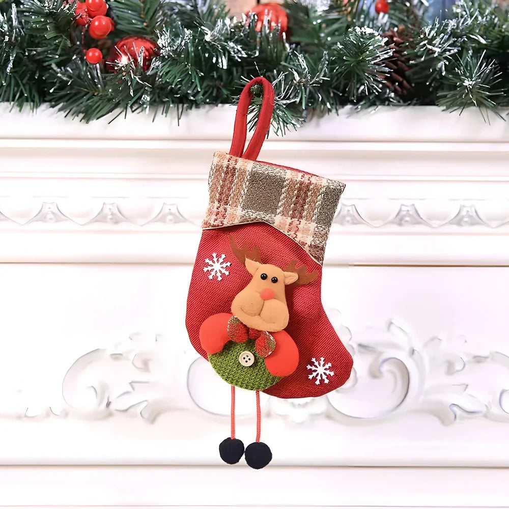 Christmas stocking gift bag measuring 10x20cm with festive character designs