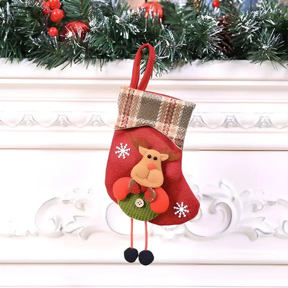 Christmas stocking gift bag measuring 10x20cm with festive character designs