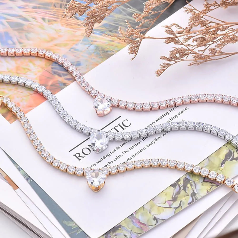 Gold heart-shaped rhinestone pet collar with adjustable chain for dogs and cats