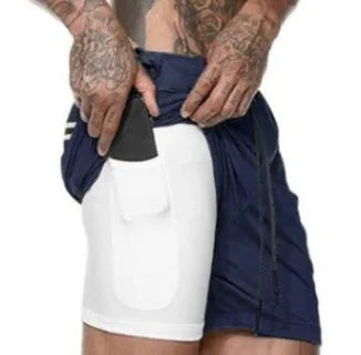 Pocket compression shorts in nylon, moisture-wicking and quick-drying, available in multiple colours and sizes S to 3XL.