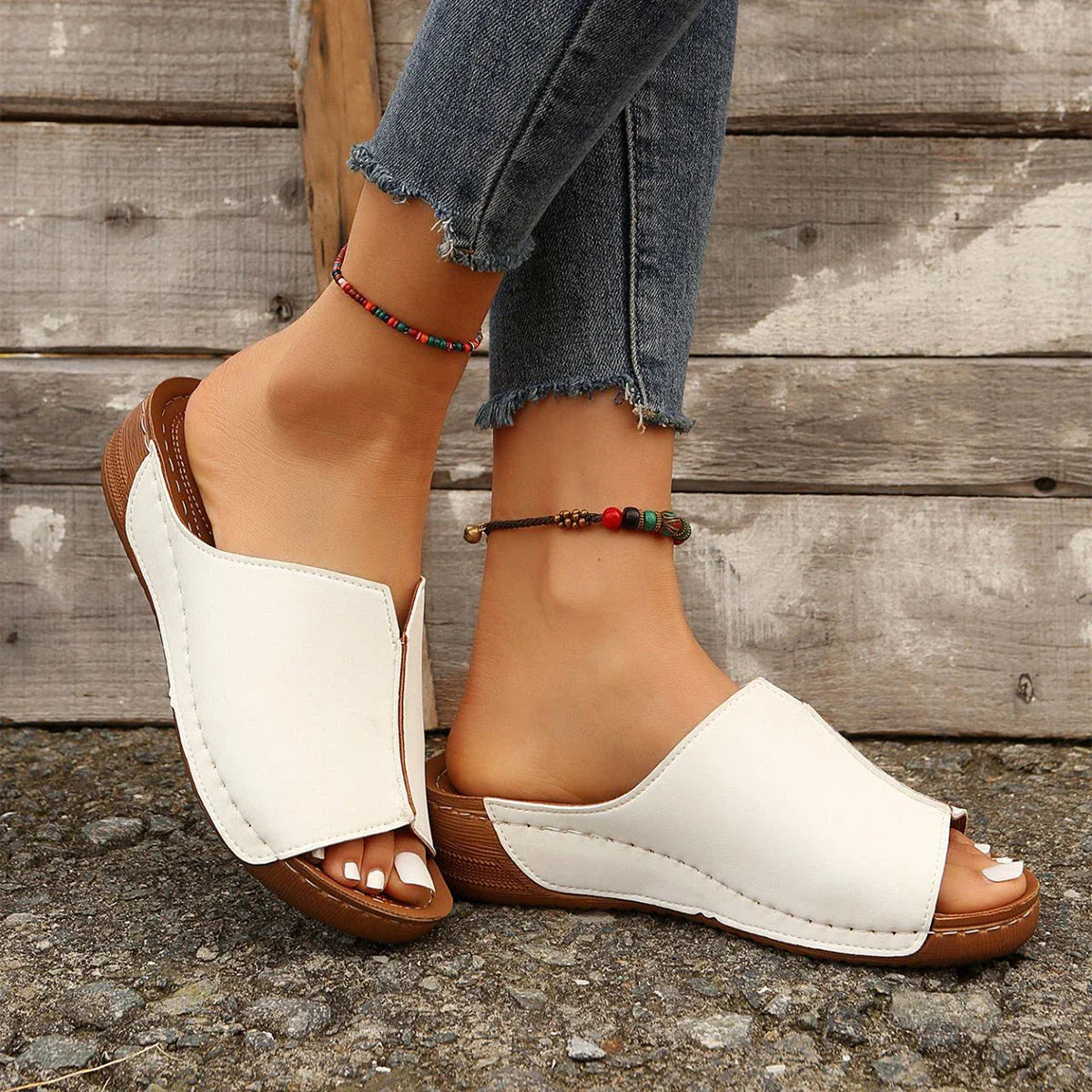 Trendy wedge sandals for women in various colors, featuring a unique European-inspired design, cushioned footbed, and non-slip sole for comfort and style.