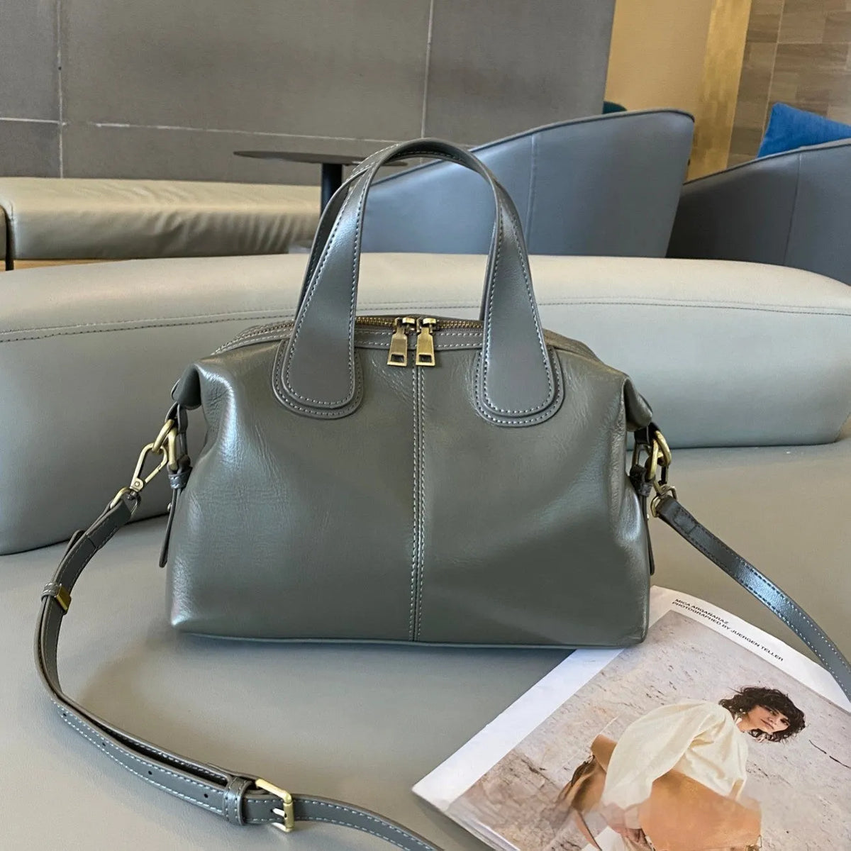 Soft pillow-shaped top grain leather handbag, 30cm x 13cm x 22cm, with double straps and inner patch pocket