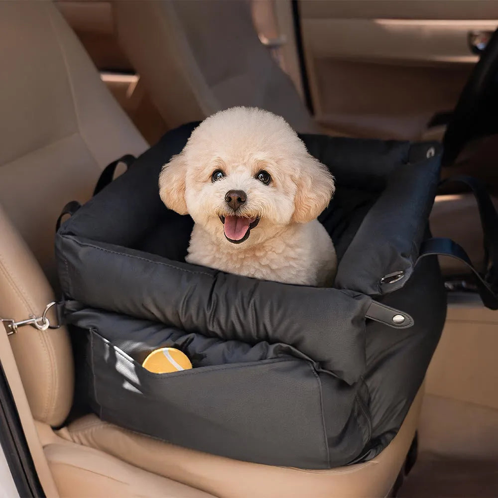 Green waterproof dog car nest with a removable cover, shown placed in a vehicle boot.
