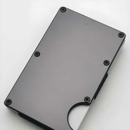 Aluminium grey carbon fibre credit card wallet with RFID-blocking feature.