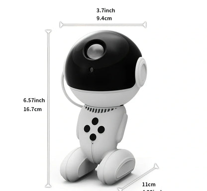 White robot-shaped star light projection lamp with USB cable and remote control on table