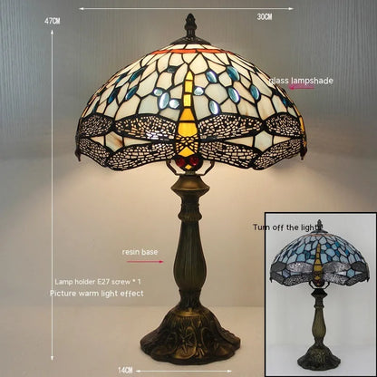 European style stone table lamp with dragonfly motif in blue finish, 30cm height